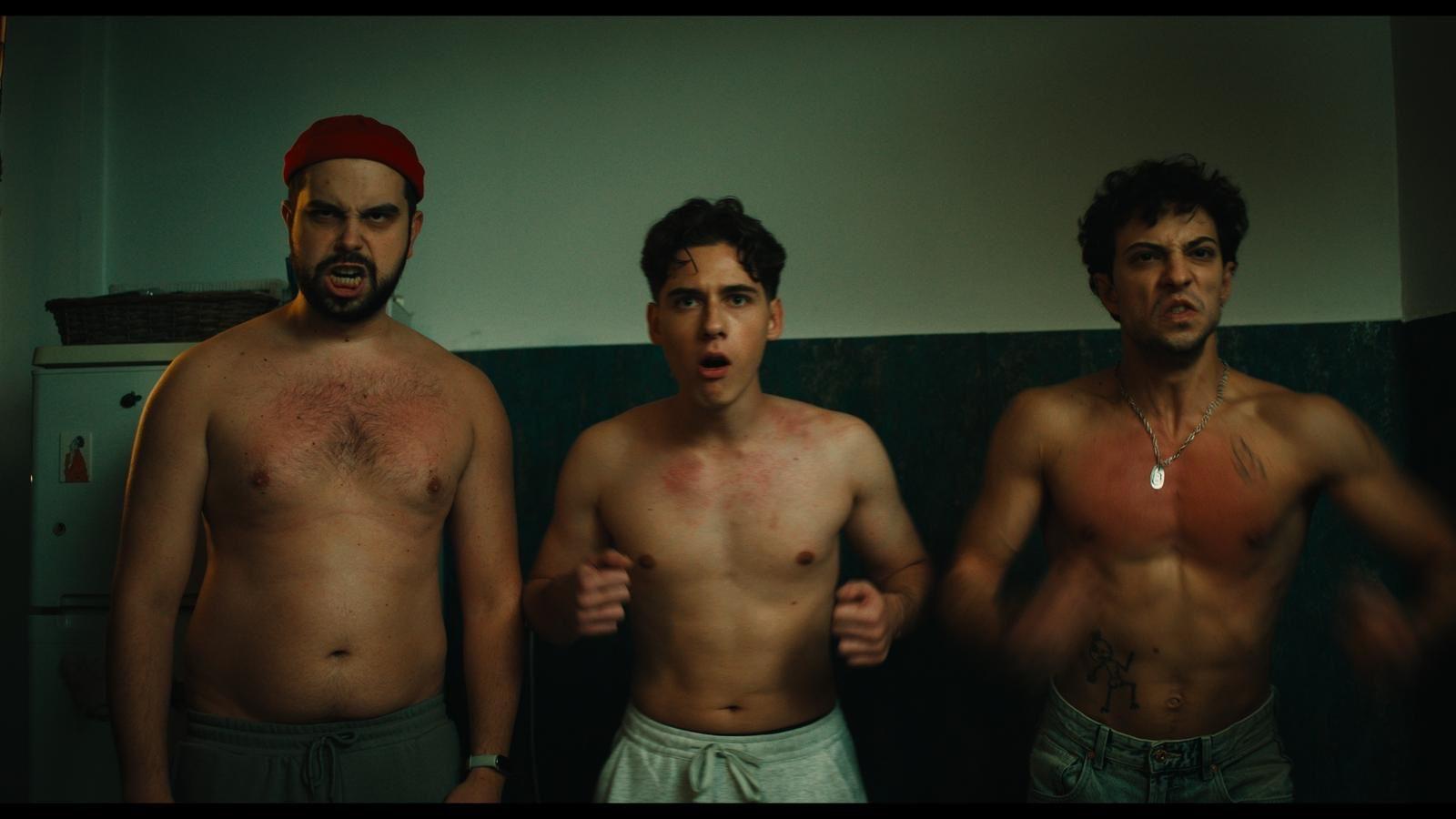 Still from Run (Aleargă), with three young men indoors